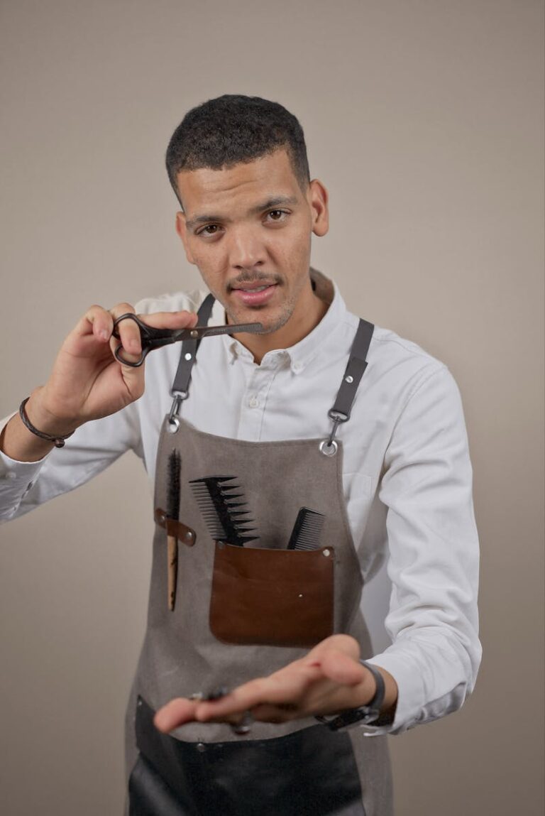 Barber Holding Scissors